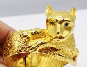 lot 57 image: Castlecliff Gold Jaguar Hinged Bangle Bracelet