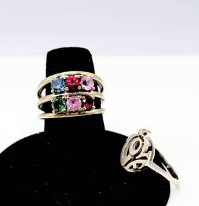 lot 79 image: 10K White Gold Love Ring and a Resco Mothers Ring with 6 Rhinestones