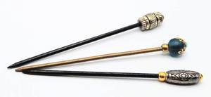 lot 98 image: 3 Vintage Hair Picks