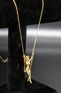 lot 2568 image: Vintage Art Nouveau Swinging Lady Gold Metal Necklace