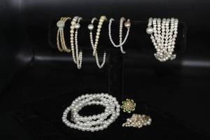 lot 2581 image: Vintage Pearl Jewelry Lot including 5 Necklace Strands, 1 Bracelet, 1 Pair of Dangle Earrings, and 1 Brooch with Jewels and Pearls