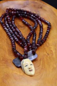 lot 2616 image: Asian Bone Face Pendant Red Glass Beaded Necklace and Matching Hoop Earrings
