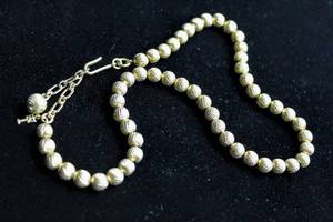 lot 2560 image: Vintage Trifari 13 Metal Bead Necklace and 2 Coordinating Cuff Bracelet
