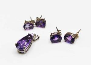 lot 115 image: Sterling Silver Pendant and 2 Pair of Earrings with Purple Stones