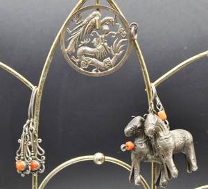 lot 126 image: Sterling Silver Dragon and Peacock Medallion Pendant, Silver Chinese Horse Earrings and additional pair of Earrings