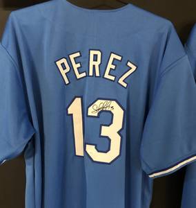 lot 1003 image: Signed Salvador Perez Kansas City Royals Full Sized Jersey James Spence Authentication WITNESSED