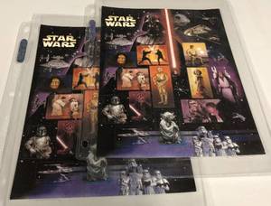 lot 1054 image: Two Pages of Stars Wars Postage Stamps - Mint Condition - 30 Total Stamps with $12.30 Face Value