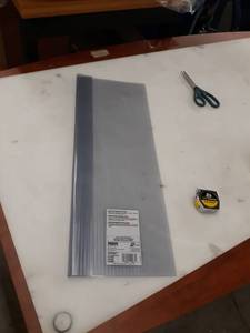 lot 24375 image: PLASTIC RUG COVER
