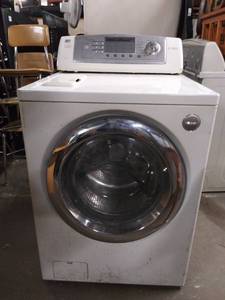 lot 5774 image: LG Tromm Front Load Washing Machine. See description