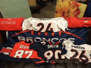 lot 5792 image: Huge Lot of Denver Broncos Jerseys, Flag and More.