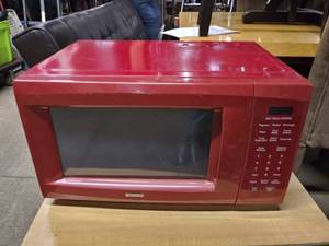 lot 5806 image: Red Kenmore Counter Top Microwave