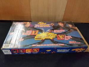 lot 7699 image: Criss Cross Crash Motorized Race Track Set in Box
