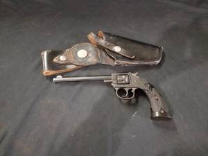 lot 7671 image: Octagon Barrel 22 Rim Fire H&R Arms Company Pistol and Holster