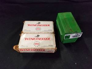lot 7679 image: Winchester 2 boxes and Plastic Ammo case w bullets