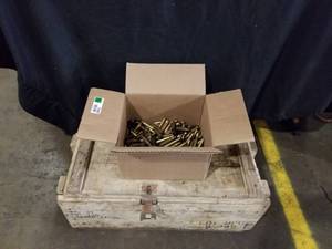 lot 7680 image: Wood Ammo Box and Empty Brass