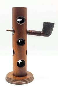 lot 1951 image: VINTAGE ESTATE PIPE TREE HOLDER WITH FELT BOTTOM AND RUBBER INSERTS IN USED CONDITION. HOLDS UP TO 5 PIPES.