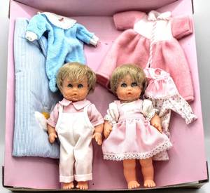 lot 2384 image: Vintage Bella Dolls Made in France, Marc and Michelle Blonde Twins Set