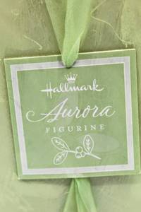 lot 2395 image: NIB Hallmark Aurora Figurine