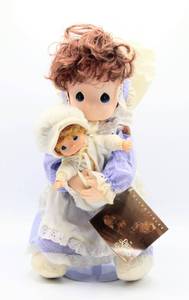 lot 2431 image: PRECIOUS MOMENTS 16 Tall Porcelain with soft body Doll