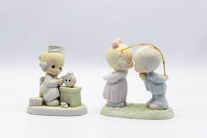 lot 2429 image: PRECIOUS MOMENTS 1990 Time Heals 523739 Nurse Figurine and 1990 Blessings From Above 523747 - Both excellent condition