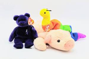 lot 2438 image: 1997 PRINCESS DIANA PURPLE BEANIE BABY Bear - 1995 INCH the Snake BEANIE BABY - 1998 SQUEALER the Pig BEANIE BUDDIES