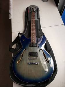 lot 4811 image: Oscar Schmidt OE30 Delta King Electric Guitar with Case