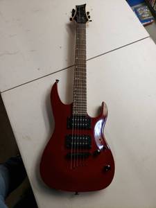 lot 4826 image: Mitchell Mm100 Red Electric Guitar