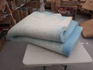 lot 8823 image: white and blue foam mattress topper unknown size