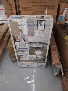 lot 9069 image: Simmons Kids Silent Auto Gliding Elite Bassinet, Basketweave