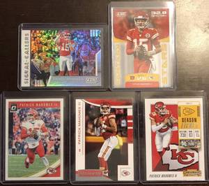 lot 1065 image: Lot of Five Patrick Mahomes Football Trading Cards - Score, Optics, Contenders, R&S, Signal Callers Insert