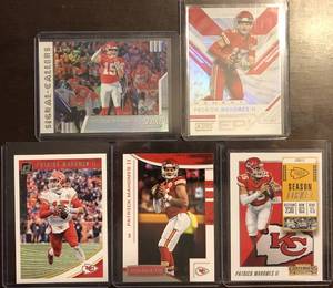lot 1066 image: Lot of Five Patrick Mahomes Football Trading Cards - Score, Optics, Contenders, R&S, Signal Callers Insert