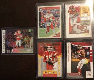 lot 1067 image: Lot of Five Patrick Mahomes Football Trading Cards - Score, Optics, Contenders, R&S, Signal Callers Insert