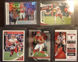 lot 1081 image: Lot of Five Patrick Mahomes Football Trading Cards - Optics, Contenders, R&S, Signal Callers, Prizm, Prestige Highlight Reel Insert