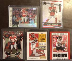 lot 1082 image: Lot of Five Patrick Mahomes Football Trading Cards - Score Insert, Unparalleled, Certified, Contenders & Draft