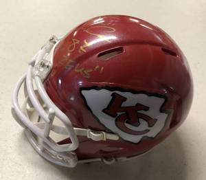 lot 1008 image: Signed Travis Kelce Gold Ink Kansas City Chiefs Mini Helmet With #87 and ZEUS Nickname Inscription With James Spence Authentication