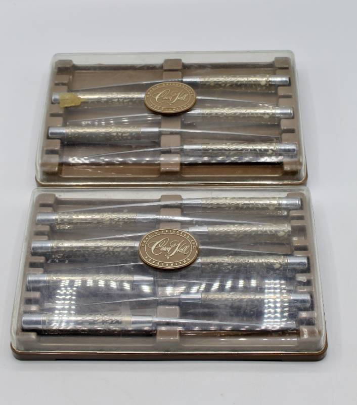 lot 2124 image: 13 Carvel Hall Steelsmiths Steak Knives Ivory Color with Silver Overlay