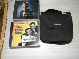 lot 3454 image: CDs and CD Traveling Case