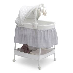 lot 28322 image: Delta Children Products Smooth Glide Bassinet, Silver Linings