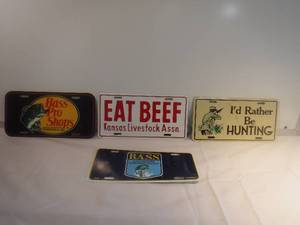 lot 11797 image: Lot of license plates- included eat beef