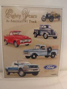 lot 11804 image: Metal Ford truck Eighty years sign