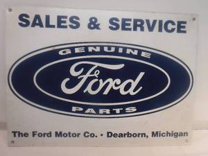 lot 11808 image: Genuine Ford parts sales and service metal sign