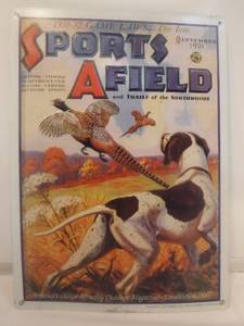 lot 11812 image: Replica magazine cover sports a field 1931 metal sign