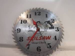 lot 11823 image: Skilsaw blade clock