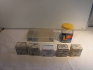lot 11828 image: Full boxes of finish nails and mixed lot of screws