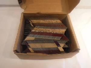 lot 11830 image: Box of paper tape nails