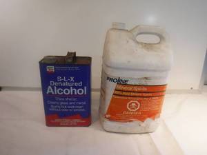 lot 11832 image: partial containers of paint cleaners