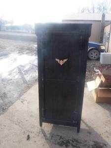 lot 11860 image: Tall dark wood cabinet that has been  blinged out and modified