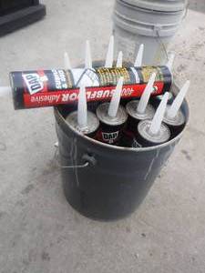 lot 11897 image: bucket of Dap subfloor and deck glue