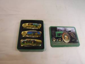 lot 11937 image: Collectors John Deere pocket knives with tin