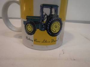 lot 11938 image: John Deere coffee cup